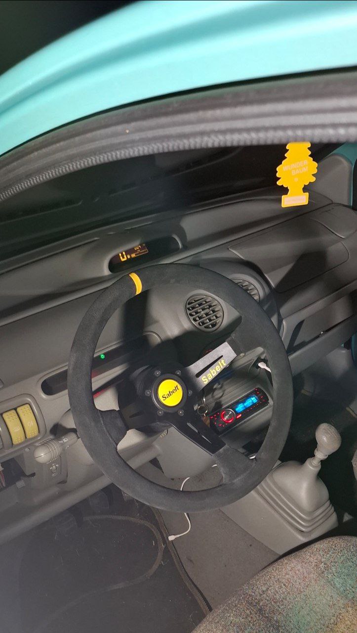 Installed a sport steering wheel today. It has a larger offset, so now I can lean back more in the seat a ride more comfortably